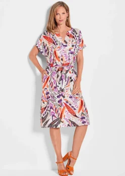 Druckkleid mit bedruckten Federn