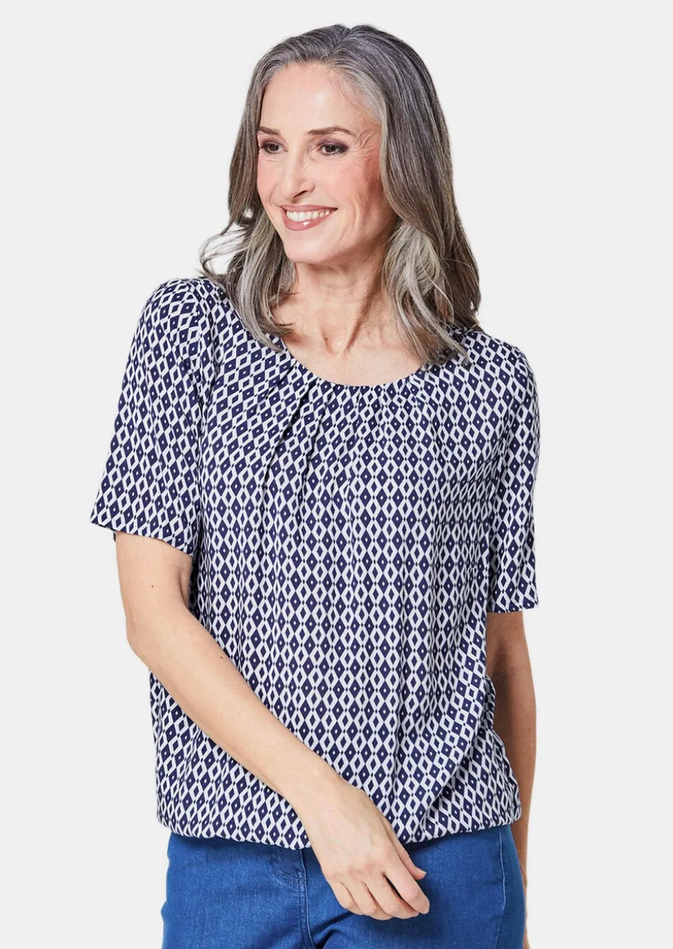 Farbbrillante Druckbluse mit liebevollen Details