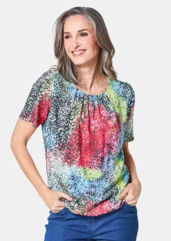 Farbbrillante Druckbluse mit liebevollen Details