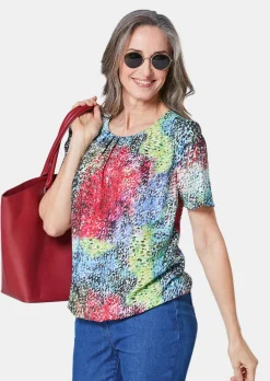 Farbbrillante Druckbluse mit liebevollen Details