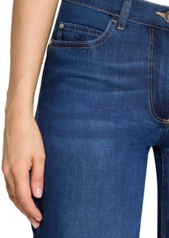 Jeans mit Lochstickerei und Fransenkante