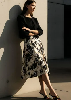 Kleid aus Jersey-Oberteil und Webrock